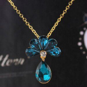 Gold Tone and Blue Crystal Necklace